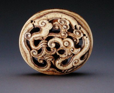 Netsuke in the Form of a Box Lid by Ozaki Kokusai